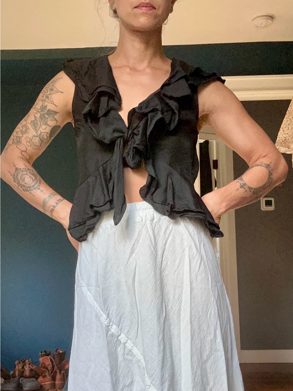Black Ruffled Tie-Front Sleeveless Top